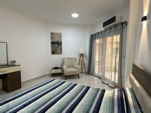 Spacious and Bright 1-Bedroom Apartment with Private Beach A