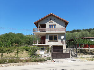 Solid villa with garage, orchard and nice views near town