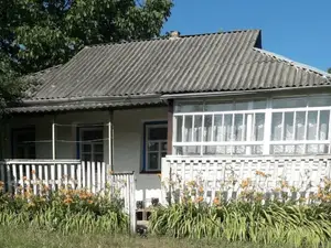 Riverside smallholding with lots of outbuildings!