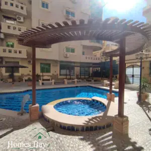 1 bedroom: Pool, roof top with sea view & nearby the beach!